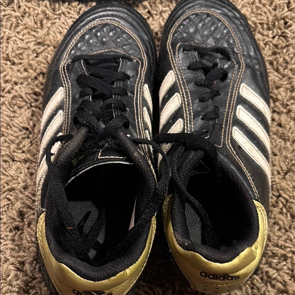 Adidas Black and White Cleats with Yellow Detail